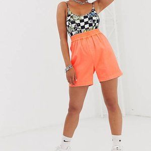 COLLUSION shorts in washed orange neon